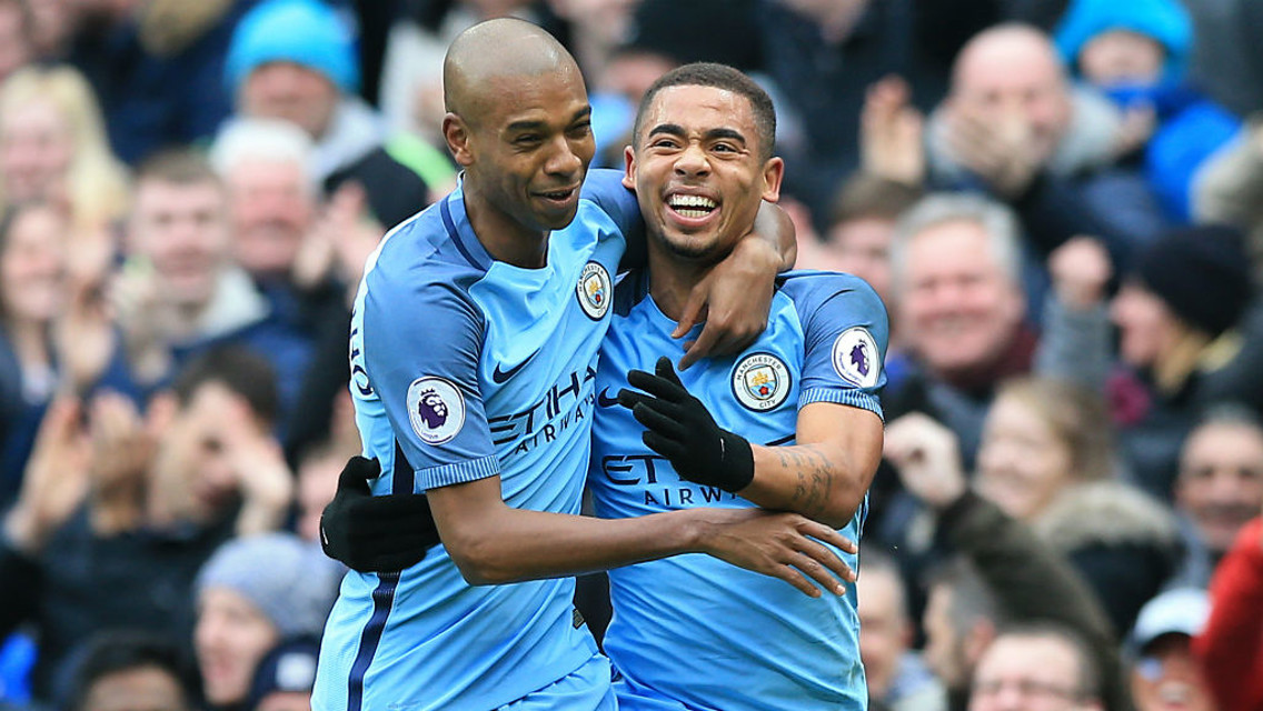 BRAZILIAN STARS: Fernandinho and Jesus embrace during a stellar City performance