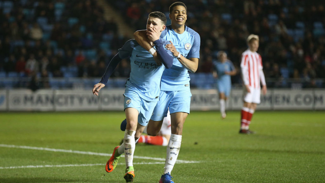 CELEBRATE: Phil Foden and Lukas Nmecha wheel away after another fine goal