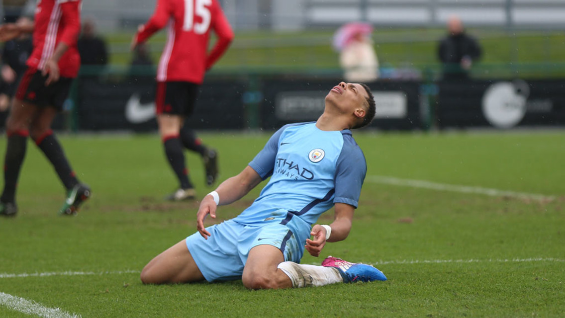 DESPAIR: Nmecha reacts as his effort in the final minute slides wide