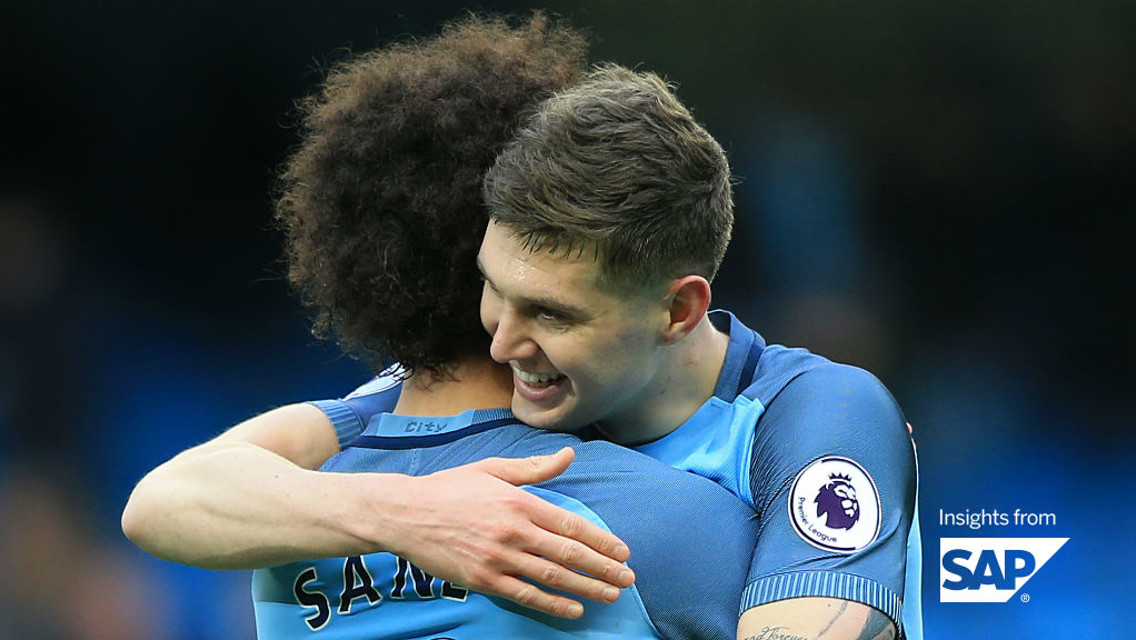 HUG IT OUT: Sane and Stones have been two of City's key men so far in 2017