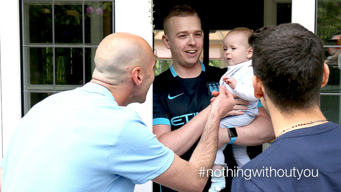 BABY BLUE: Willy Caballero and Jesus Navas meet one of Man City's youngest fans
