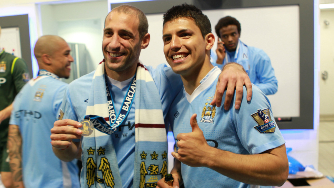 ARGENTINIAN BLUES: Pablo Zabaleta and Sergio Aguero pose with their Premier League winners' medals in 2012