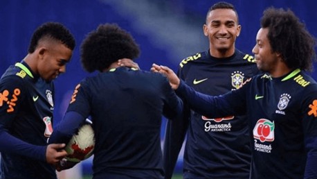 PLAYER POSTCARDS: Gabriel Jesus and Danilo in action for Brazil.