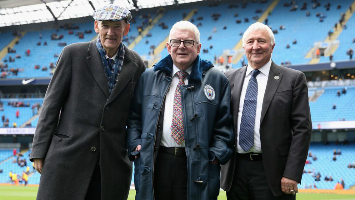MOTTY: Ahead of John Motson's final commentary appearance at the Etihad, Bernard Halford and Mike Summerbee presented him with a City sheepskin coat!