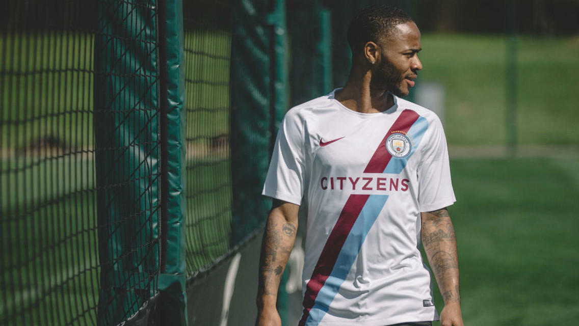 JUST CHAMPION: Raheem Sterling models the shirt