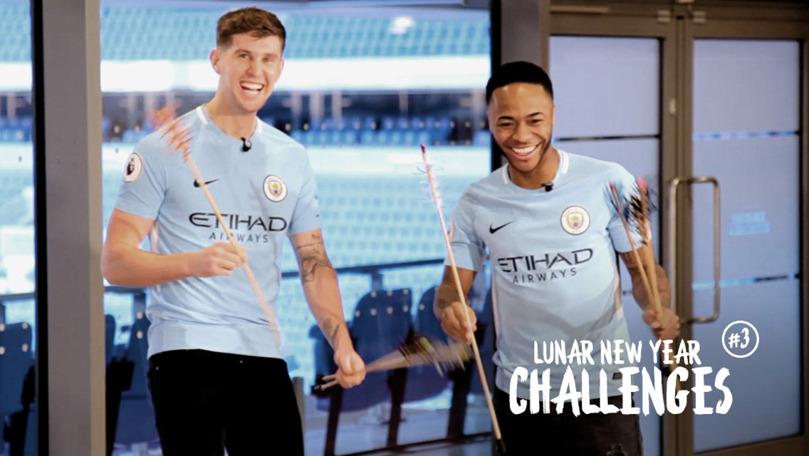 ON TARGET: Raheem Sterling and John Stones take on our Lunar New Year arrows challenge.