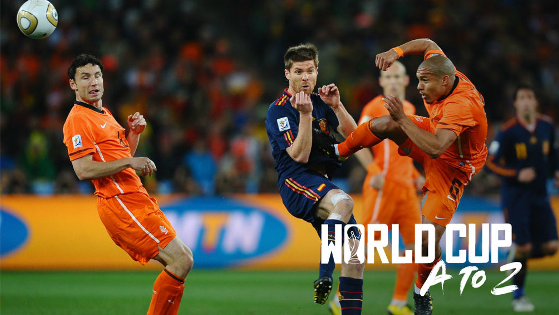 FLASHPOINT: Nigel de Jong of the Netherlands challenges Spain's Xabi Alonso during the 2010 World Cup final