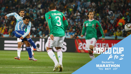 T IS FOR TEVEZ: Carlos powers the ball home against Mexico in 2010