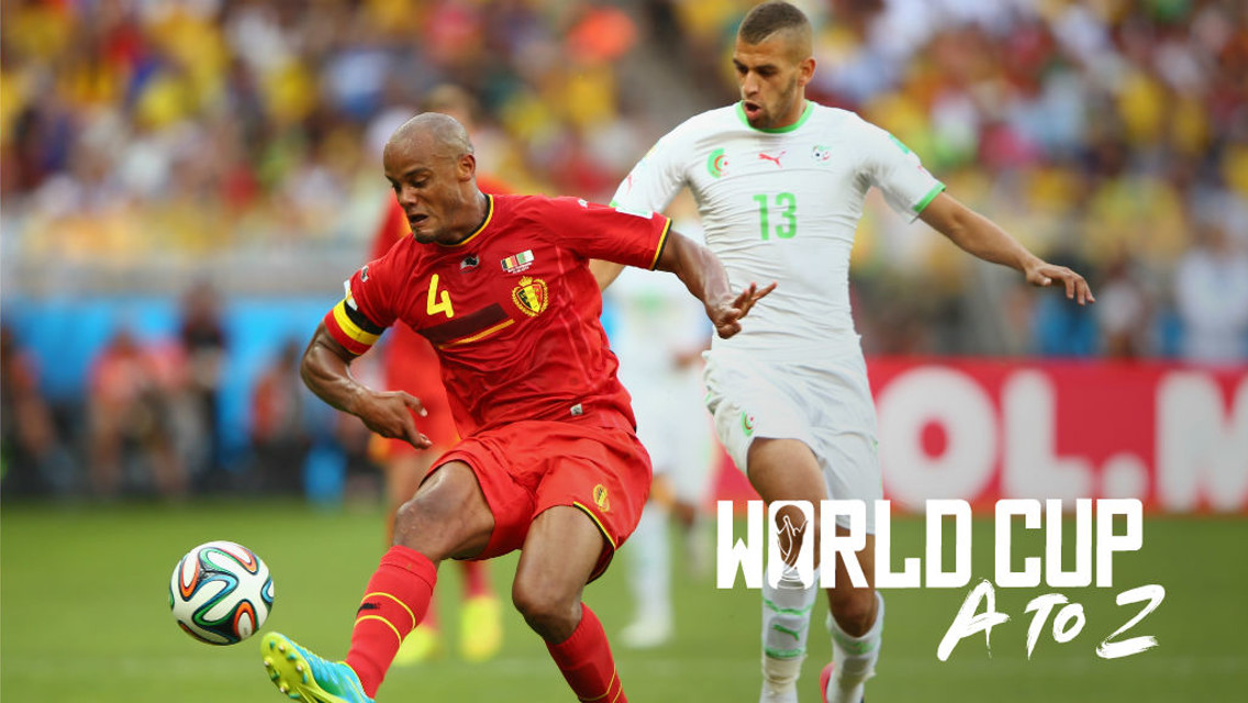 CENTRE OF ATTENTION: Vincent Kompany clears the danger during Belgium's World Cup clash against Algeria at the 2014 World Cup finals