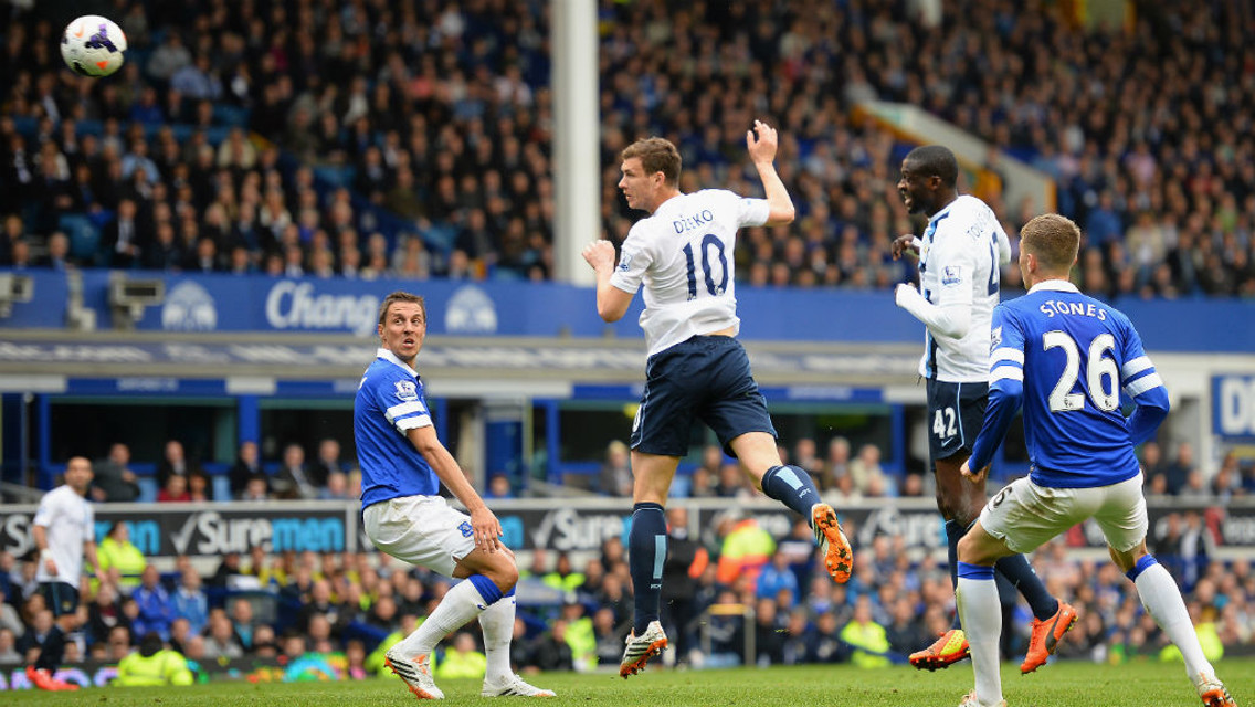 MATCH-WINNER: Edin Dzeko nets a crucial strike against Everton in the 2014 title run-in.