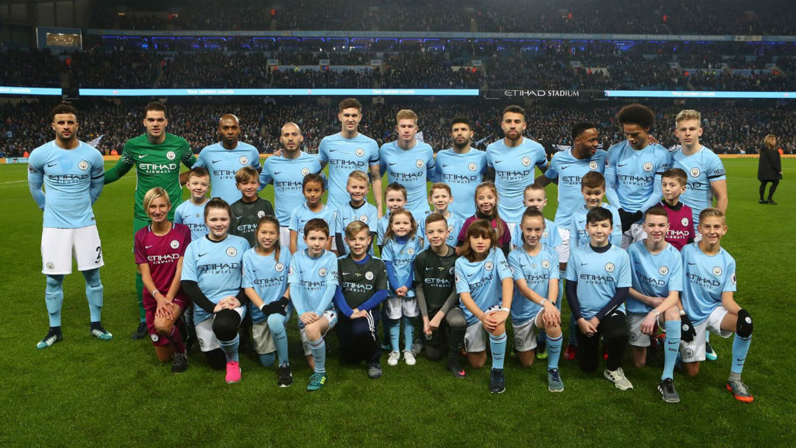 TEAM PHOTO: Skill City winners with the first team before kick-off at the Newcastle game.