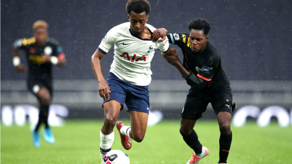 
                        ACTION STATIONS: Jeremie Frimpong challenges Spurs' Tashan Oakley-Boothe
                
