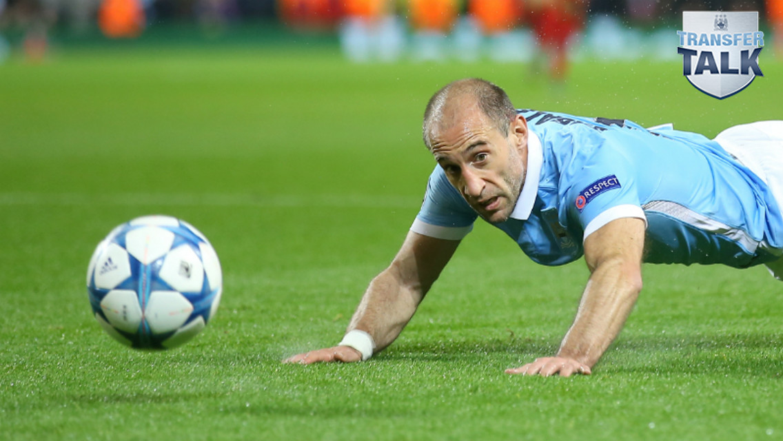 Manchester City defender Pablo Zabaleta dives for a header