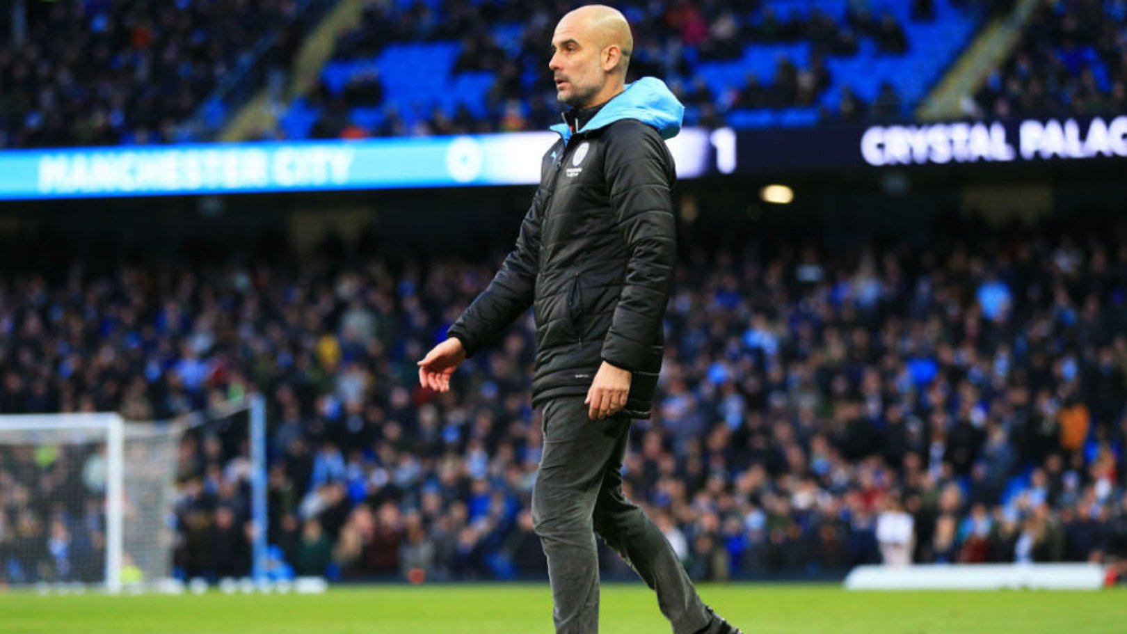 THE BOSS: Guardiola watches on from the touchline.