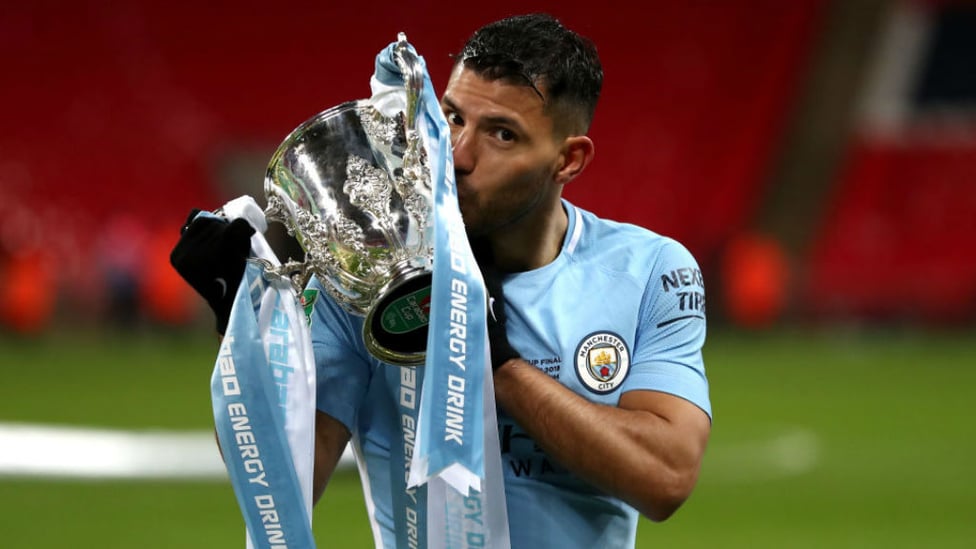 MOMENT TO SAVOUR : Sergio embraces the Carabao Cup after our victory over Arsenal in the 2018 final