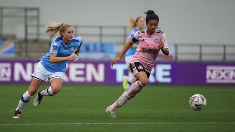 ON THE RUN: Laura Coombs gives chase against Leicester City.