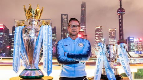 WORLD TOUR: Paul Dickov with City's silverware in Shanghai