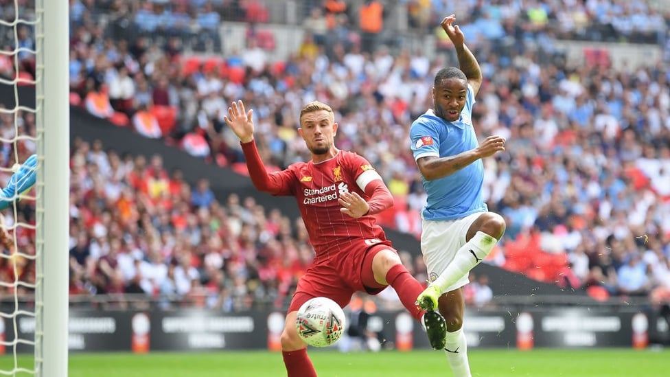 NO MISTAKE : Raheem Sterling fires City into the lead on 12 minutes.