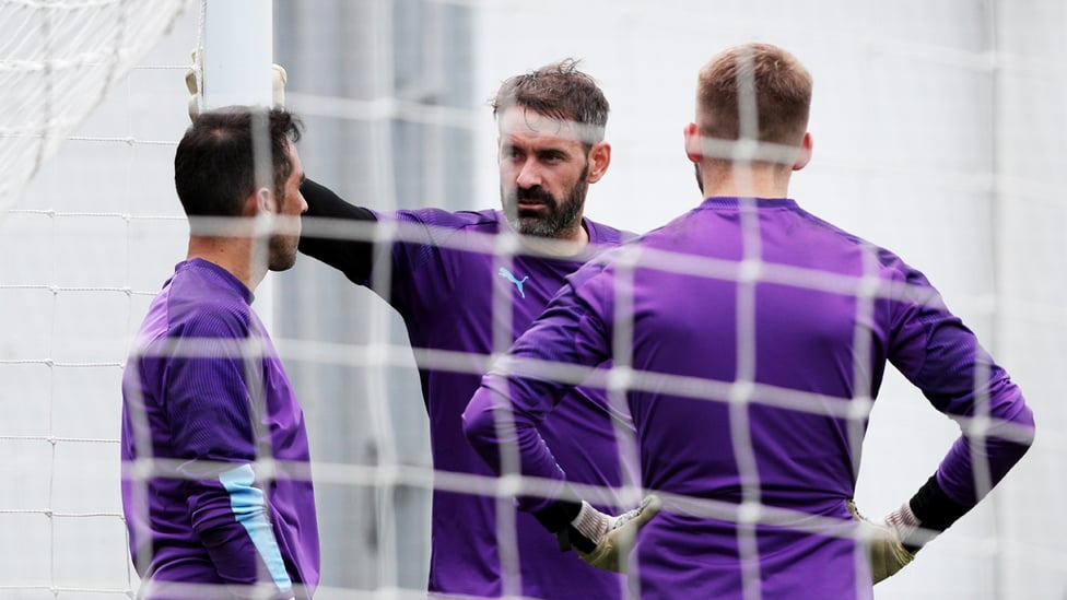 NEW BOY : Scott Carson chats with his new teammates.