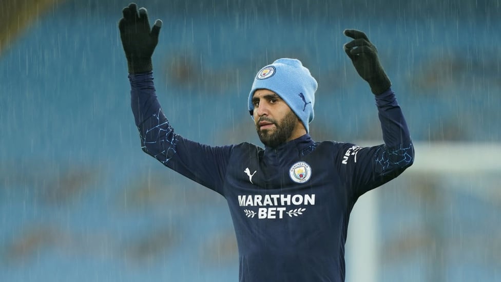 MAH-RAIN : Our Algerian speedster is adequately wrapped up in the heavy rain at the Etihad.