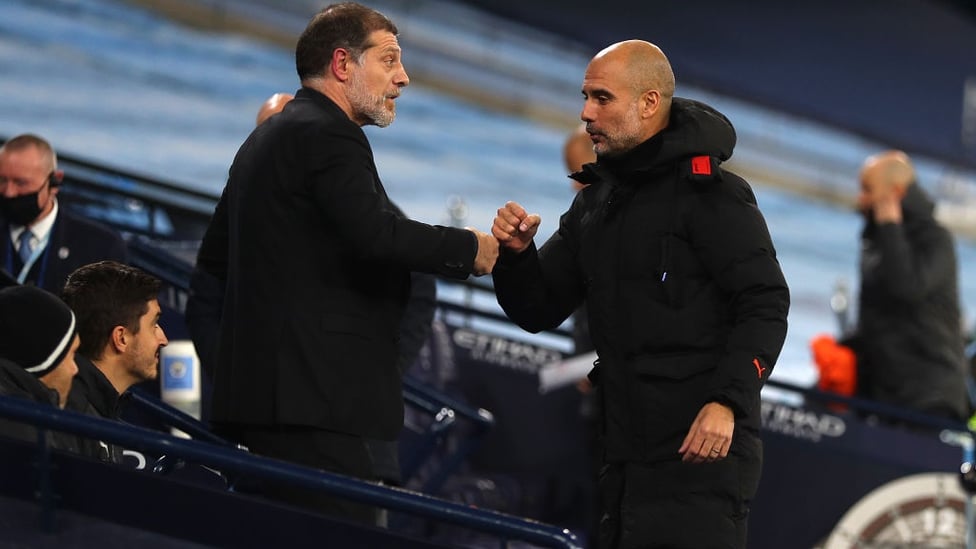 BOSSES : Guardiola and Bilic share a fist bump before kick-off.