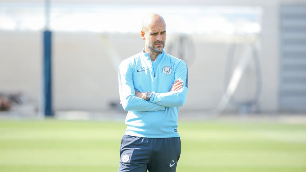 WATCHING BRIEF : Pep Guardiola casts a careful eye over training