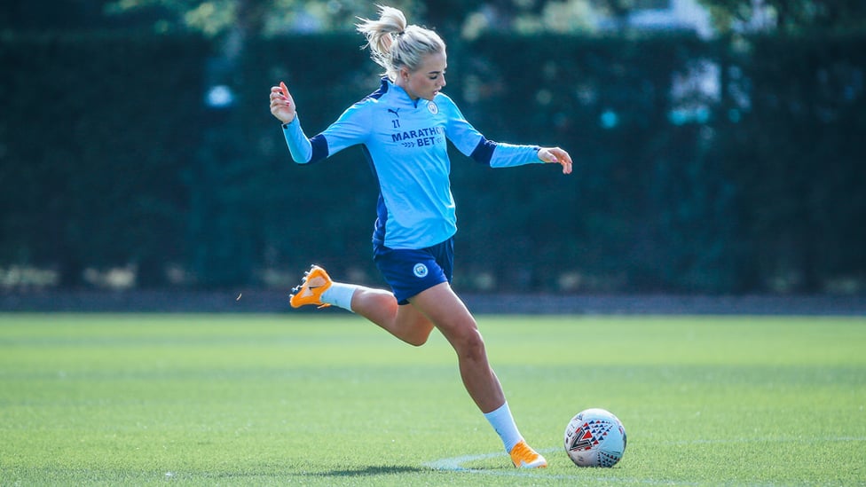 BY THE LEFT: Alex Greenwood whips in a cross