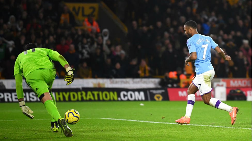 DEADLOCK BROKEN : ...And Raheem Sterling strokes home after Rui Patricio's initial penalty save