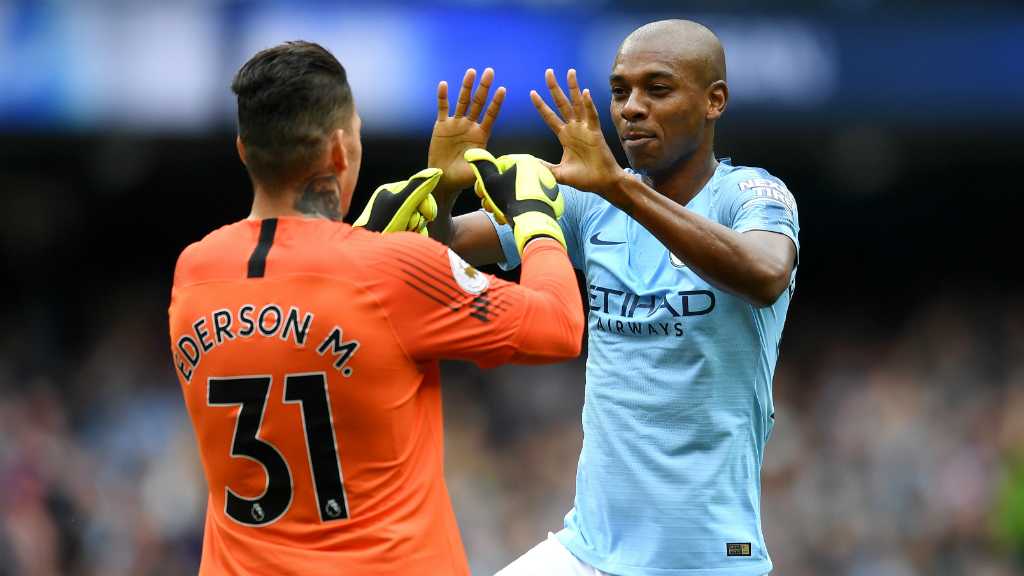 HE'S A KEEPER : Fernandinho congratulates Ederson on his outrageous assist - City's first created by a goalkeeper in the Premier League!