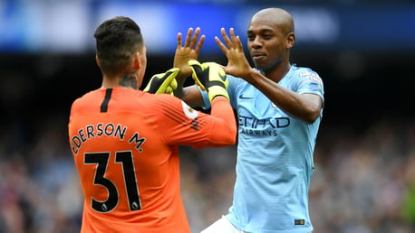 HE'S A KEEPER: Fernandinho congratulates Ederson on his outrageous assist - City's first created by a goalkeeper in the Premier League!