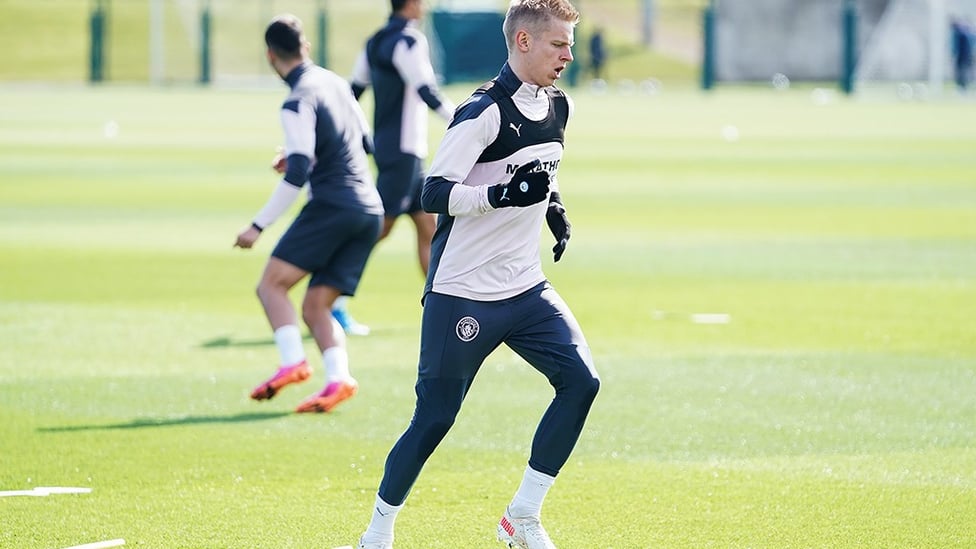 LEKS AND LOAD: Oleksandr Zinchenko limbers up for the session