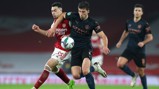 ROCKIN' RUBEN: Ruben Dias shields the play from Gabriel Martinelli