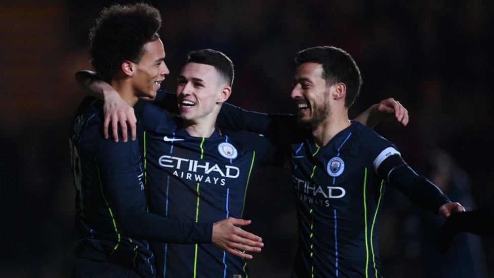 TRIO : Leroy, Phil and David express there delight after Foden's second goal.