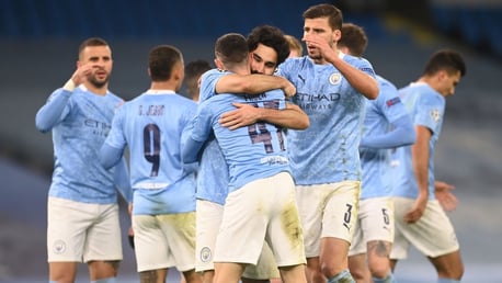 MAIN MAN: The team celebrate with the youngster after his great finish!