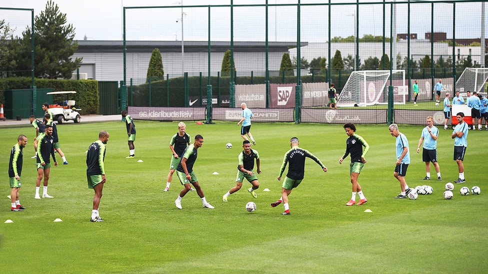 VIEWS : Pep's men on the training pitch.