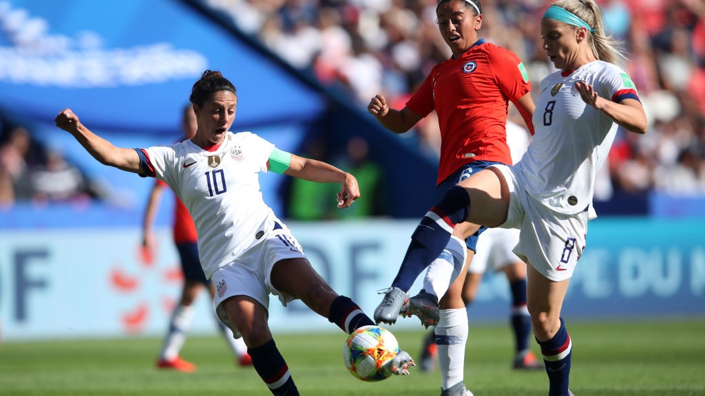 ACE: Carli Lloyd catches the ball sweetly for her opening goal against Chile.