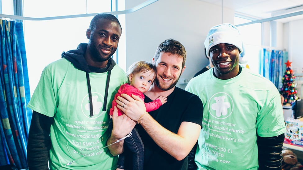 SPREADING SOME JOY : Visiting hospital patients at Christmastime