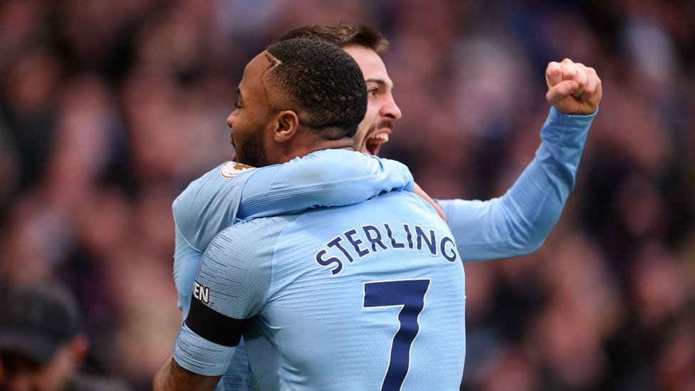 1-0 : Raheem Sterling celebrates his first goal of the game with Bernardo Silva.