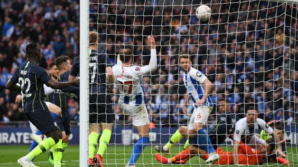 NICK OF TIME : Aymeric Laporte saves a certain goal as he just beats Brighton's Glenn Murray to the ball and clears over the bar