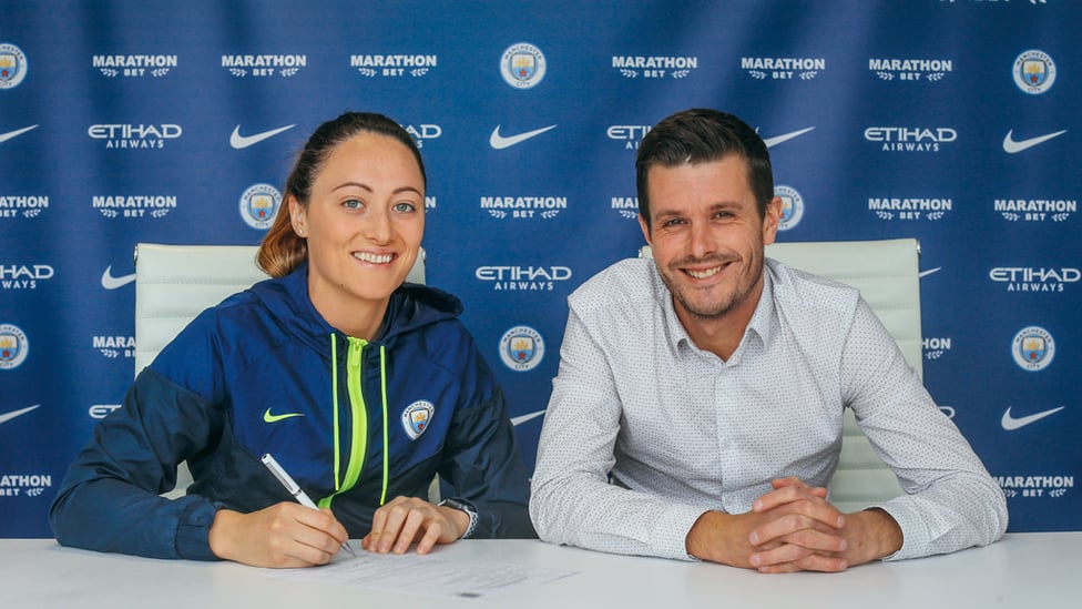 SIGN LANGUAGE : Megan with Head of Women's Football Gavin Makel