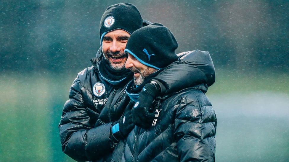 THE BOSS : Pep Guardiola shares a smile with fitness coach Lorenzo Buenaventura