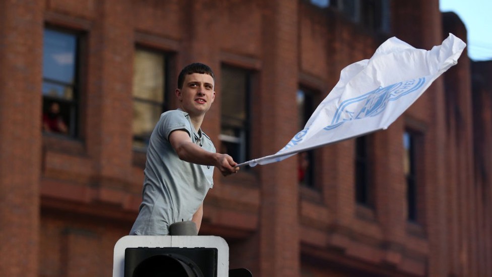 FLYING THE FLAG : Any vantage point would do!