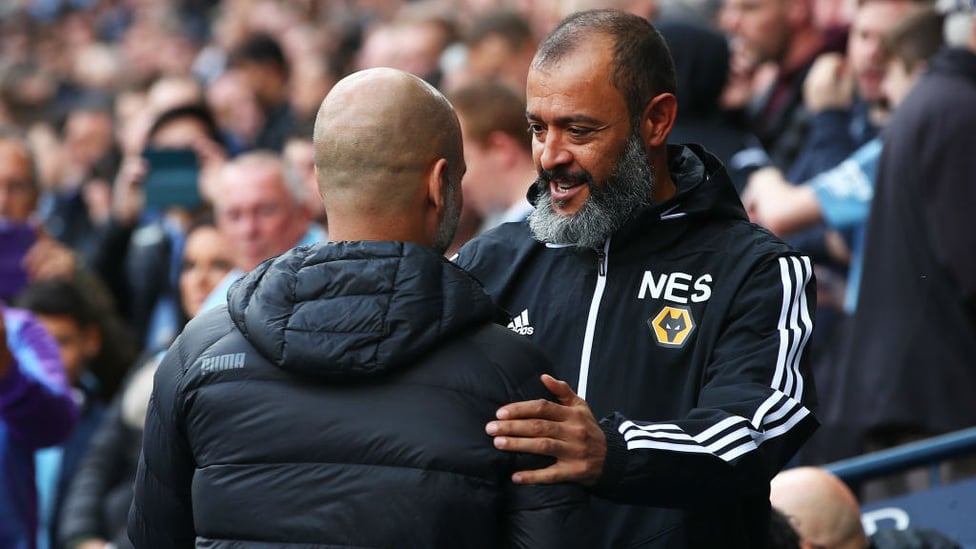 GAFFERS : Pep Guardiola and Nuno Espirito Santo embrace ahead of kick off.