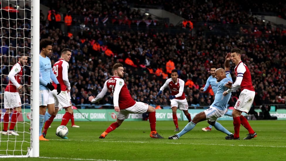 POACHER'S FINISH : Kompany scores City's second in the 2017/18 League Cup Final triumph over Arsenal