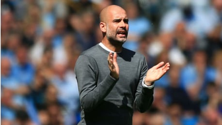 UP AND AT 'EM: Pep Guardiola urges the City players on