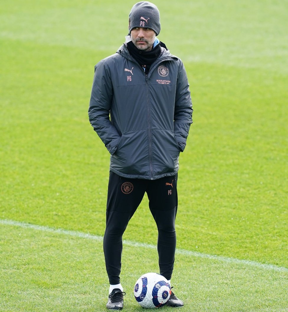 THE BOSS: Pep Guardiola watches on