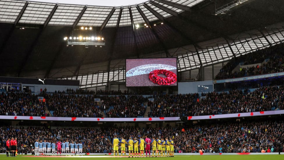 WE WILL REMEMBER THEM : All the players and fans observe a perfect minute's silence to remember our fallen heroes.