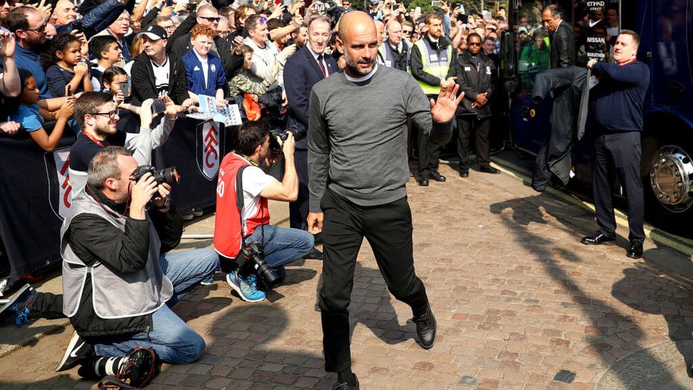 THE BOSS : Pep Guardiola arrives at Craven Cottage