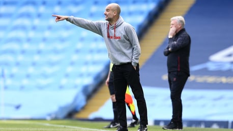 PEP TALK: Guardiola provides instructions from the touchline.