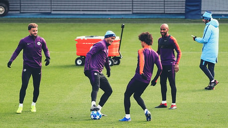 FOUR'S KOMPANY: The skipper has some fun with Leroy Sane